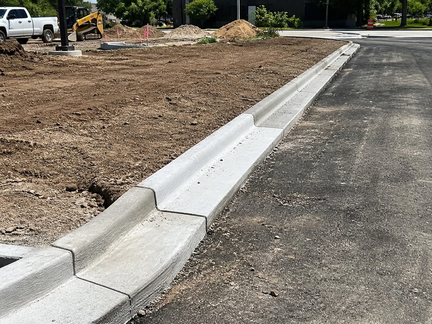 Finished concrete driveway in Gladstone, MO — broom finish with clean control joints